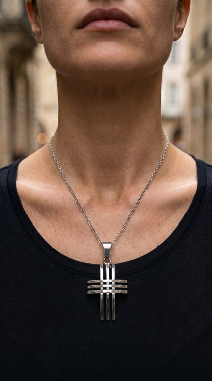 THE TRIFOLD CROSS